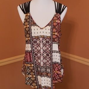 Sleeveless top with a strappy back. LG EUC.